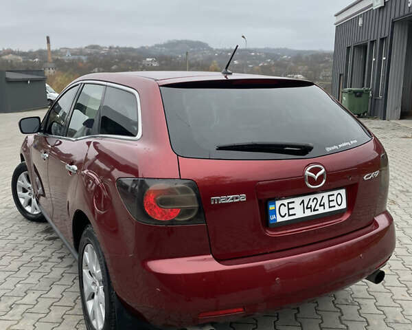 Красный Мазда СХ-7, объемом двигателя 2.26 л и пробегом 100 тыс. км за 5950 $, фото 7 на Automoto.ua