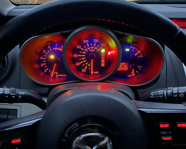 Красный Мазда СХ-7, объемом двигателя 2.26 л и пробегом 100 тыс. км за 5950 $, фото 13 на Automoto.ua