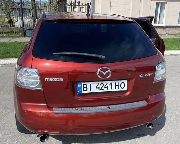 Красный Мазда СХ-7, объемом двигателя 2.26 л и пробегом 148 тыс. км за 7200 $, фото 9 на Automoto.ua