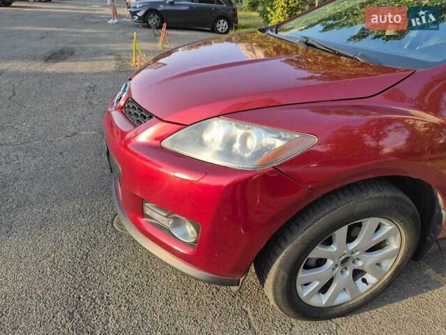 Красный Мазда СХ-7, объемом двигателя 2.3 л и пробегом 169 тыс. км за 5700 $, фото 14 на Automoto.ua