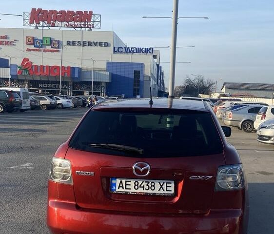 Красный Мазда СХ-7, объемом двигателя 2.3 л и пробегом 255 тыс. км за 6600 $, фото 1 на Automoto.ua