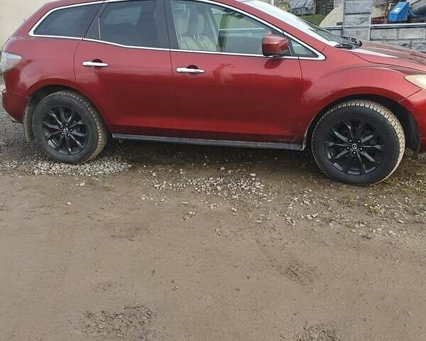 Красный Мазда СХ-7, объемом двигателя 2.3 л и пробегом 290 тыс. км за 5000 $, фото 1 на Automoto.ua