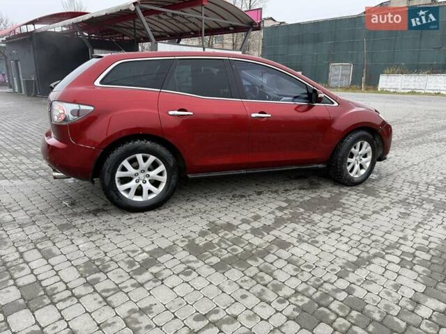 Красный Мазда СХ-7, объемом двигателя 2.3 л и пробегом 210 тыс. км за 4000 $, фото 1 на Automoto.ua