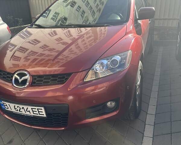 Красный Мазда СХ-7, объемом двигателя 2.3 л и пробегом 125 тыс. км за 6500 $, фото 3 на Automoto.ua