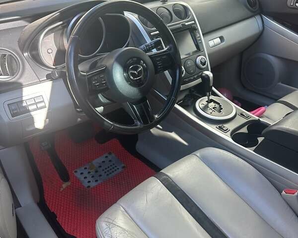 Красный Мазда СХ-7, объемом двигателя 2.3 л и пробегом 125 тыс. км за 6500 $, фото 4 на Automoto.ua