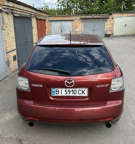 Красный Мазда СХ-7, объемом двигателя 2.3 л и пробегом 105 тыс. км за 8200 $, фото 2 на Automoto.ua