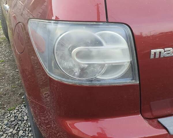 Красный Мазда СХ-7, объемом двигателя 2.3 л и пробегом 290 тыс. км за 5000 $, фото 5 на Automoto.ua