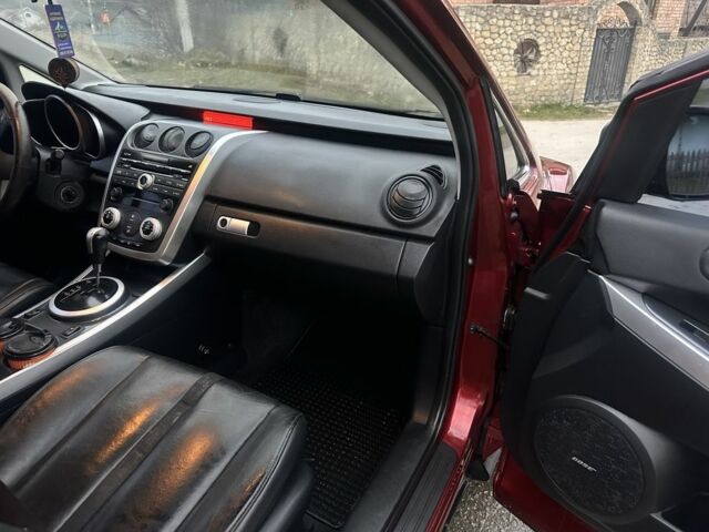 Красный Мазда СХ-7, объемом двигателя 2.3 л и пробегом 210 тыс. км за 5500 $, фото 1 на Automoto.ua