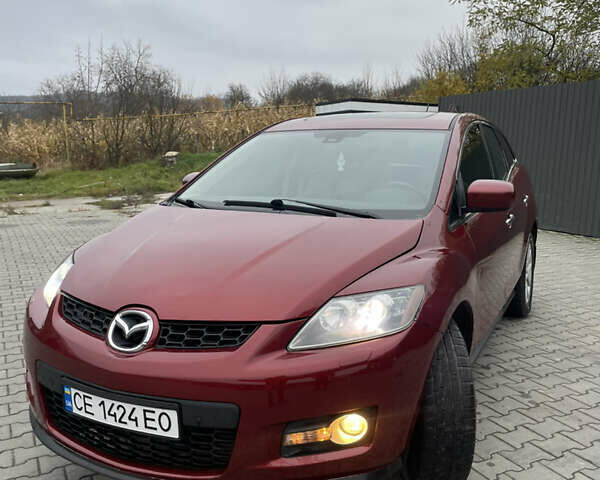 Красный Мазда СХ-7, объемом двигателя 2.26 л и пробегом 100 тыс. км за 5950 $, фото 5 на Automoto.ua