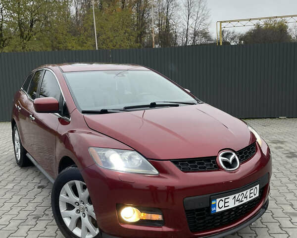 Красный Мазда СХ-7, объемом двигателя 2.26 л и пробегом 100 тыс. км за 5950 $, фото 1 на Automoto.ua