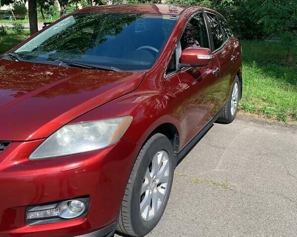 Красный Мазда СХ-7, объемом двигателя 2.3 л и пробегом 169 тыс. км за 5700 $, фото 4 на Automoto.ua