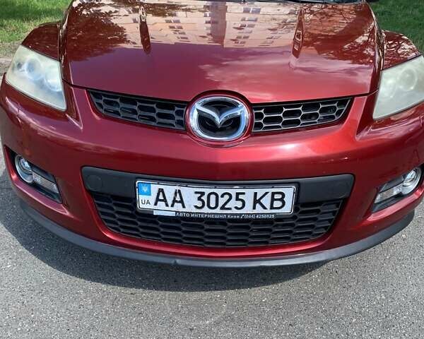Красный Мазда СХ-7, объемом двигателя 2.3 л и пробегом 169 тыс. км за 5700 $, фото 1 на Automoto.ua