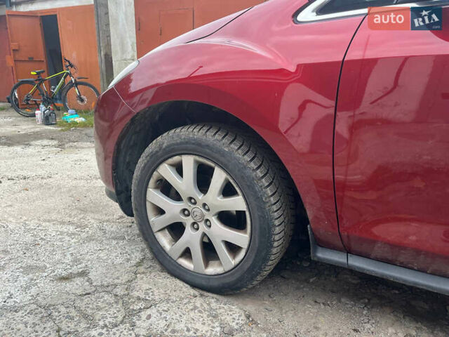 Красный Мазда СХ-7, объемом двигателя 2.3 л и пробегом 241 тыс. км за 6200 $, фото 14 на Automoto.ua