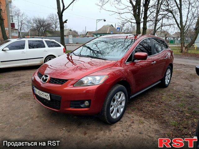 Красный Мазда СХ-7, объемом двигателя 2.3 л и пробегом 157 тыс. км за 6600 $, фото 1 на Automoto.ua