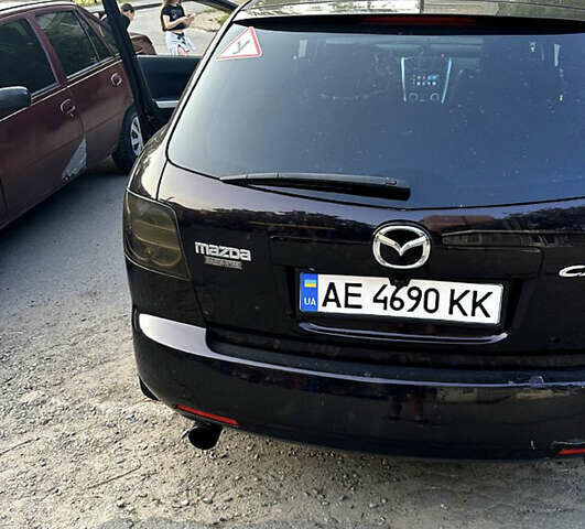 Красный Мазда СХ-7, объемом двигателя 2.26 л и пробегом 136 тыс. км за 6200 $, фото 3 на Automoto.ua