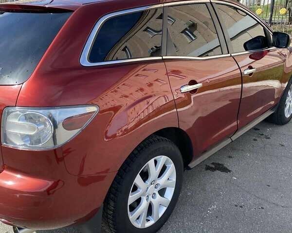 Красный Мазда СХ-7, объемом двигателя 2.26 л и пробегом 148 тыс. км за 7200 $, фото 8 на Automoto.ua