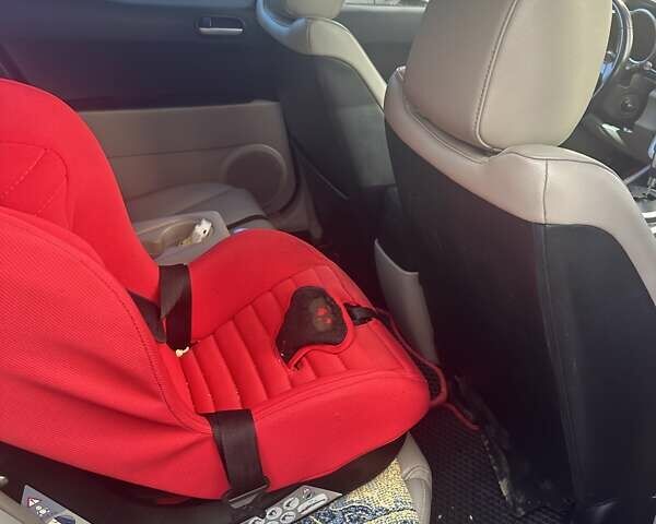 Красный Мазда СХ-7, объемом двигателя 2.3 л и пробегом 125 тыс. км за 6500 $, фото 7 на Automoto.ua