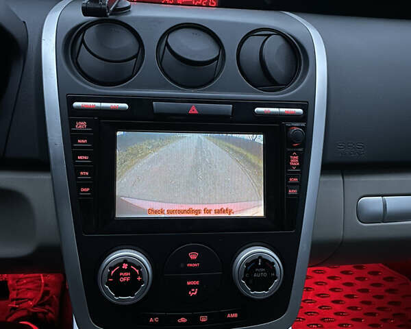 Красный Мазда СХ-7, объемом двигателя 2.26 л и пробегом 100 тыс. км за 5950 $, фото 14 на Automoto.ua