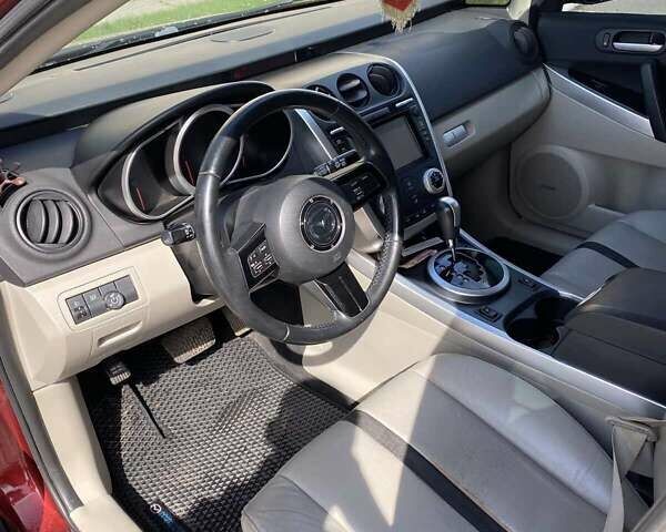 Красный Мазда СХ-7, объемом двигателя 2.26 л и пробегом 148 тыс. км за 7200 $, фото 3 на Automoto.ua