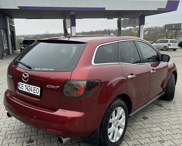 Красный Мазда СХ-7, объемом двигателя 2.26 л и пробегом 100 тыс. км за 5950 $, фото 10 на Automoto.ua