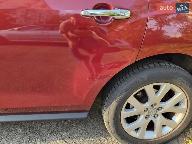 Красный Мазда СХ-7, объемом двигателя 2.3 л и пробегом 169 тыс. км за 5700 $, фото 15 на Automoto.ua