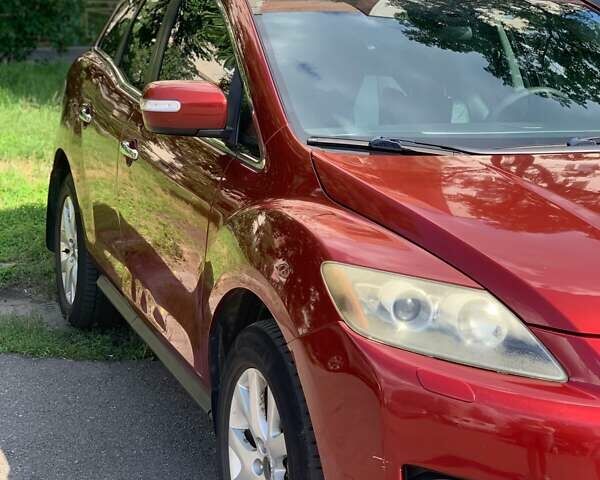 Красный Мазда СХ-7, объемом двигателя 2.3 л и пробегом 169 тыс. км за 5700 $, фото 3 на Automoto.ua