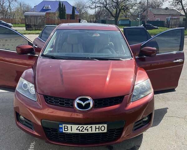 Красный Мазда СХ-7, объемом двигателя 2.26 л и пробегом 148 тыс. км за 7200 $, фото 4 на Automoto.ua