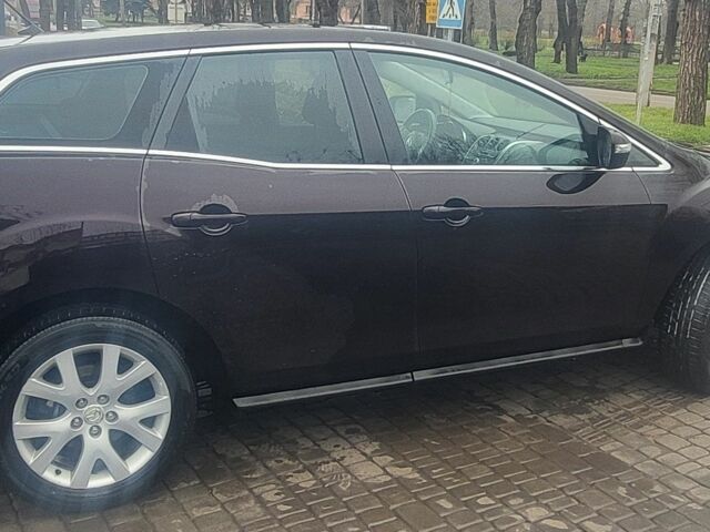 Красный Мазда СХ-7, объемом двигателя 2.3 л и пробегом 212 тыс. км за 5700 $, фото 2 на Automoto.ua