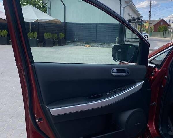 Красный Мазда СХ-7, объемом двигателя 2.3 л и пробегом 365 тыс. км за 6500 $, фото 23 на Automoto.ua