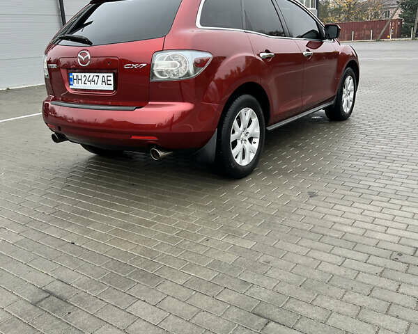 Красный Мазда СХ-7, объемом двигателя 2.26 л и пробегом 74 тыс. км за 7950 $, фото 10 на Automoto.ua