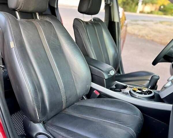 Красный Мазда СХ-7, объемом двигателя 2.3 л и пробегом 195 тыс. км за 6700 $, фото 31 на Automoto.ua