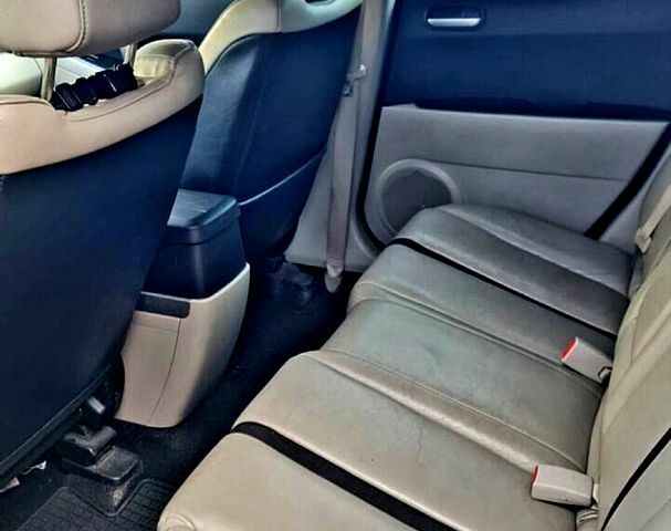 Красный Мазда СХ-7, объемом двигателя 2.3 л и пробегом 240 тыс. км за 7500 $, фото 4 на Automoto.ua