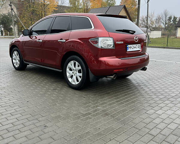Красный Мазда СХ-7, объемом двигателя 2.26 л и пробегом 74 тыс. км за 7950 $, фото 3 на Automoto.ua