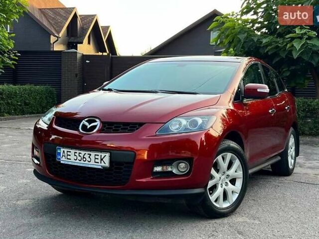 Красный Мазда СХ-7, объемом двигателя 2.3 л и пробегом 195 тыс. км за 6700 $, фото 1 на Automoto.ua