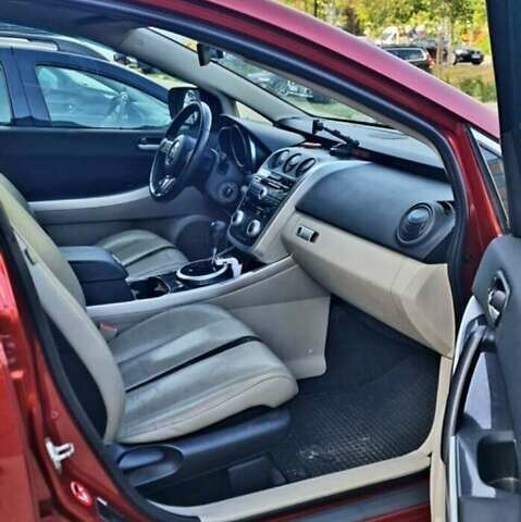 Красный Мазда СХ-7, объемом двигателя 2.3 л и пробегом 240 тыс. км за 7500 $, фото 1 на Automoto.ua