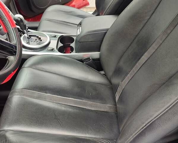 Красный Мазда СХ-7, объемом двигателя 2.26 л и пробегом 203 тыс. км за 7300 $, фото 6 на Automoto.ua