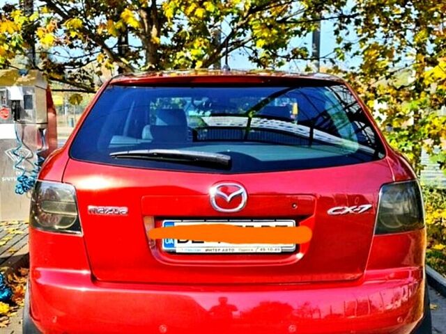 Красный Мазда СХ-7, объемом двигателя 2.3 л и пробегом 240 тыс. км за 7500 $, фото 2 на Automoto.ua