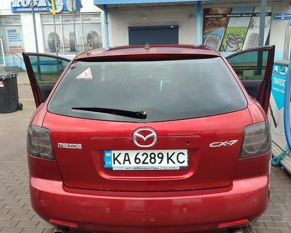 Красный Мазда СХ-7, объемом двигателя 2.26 л и пробегом 203 тыс. км за 7300 $, фото 2 на Automoto.ua