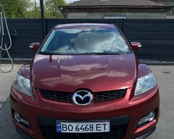 Красный Мазда СХ-7, объемом двигателя 2.3 л и пробегом 365 тыс. км за 6500 $, фото 1 на Automoto.ua
