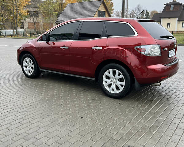 Красный Мазда СХ-7, объемом двигателя 2.26 л и пробегом 74 тыс. км за 7950 $, фото 1 на Automoto.ua