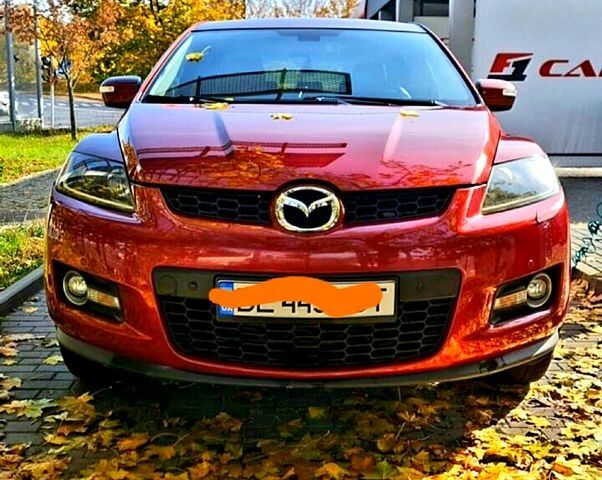 Красный Мазда СХ-7, объемом двигателя 2.3 л и пробегом 240 тыс. км за 7500 $, фото 1 на Automoto.ua