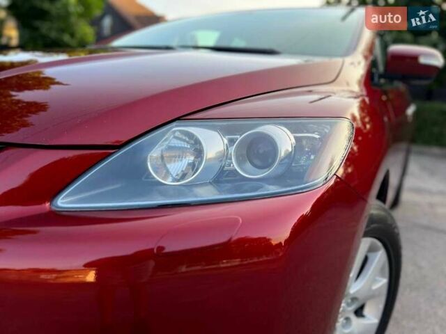 Красный Мазда СХ-7, объемом двигателя 2.3 л и пробегом 195 тыс. км за 6700 $, фото 3 на Automoto.ua
