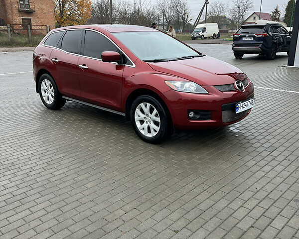 Красный Мазда СХ-7, объемом двигателя 2.26 л и пробегом 74 тыс. км за 7950 $, фото 17 на Automoto.ua