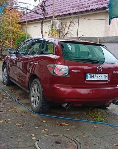 Красный Мазда СХ-7, объемом двигателя 2.3 л и пробегом 135 тыс. км за 7654 $, фото 3 на Automoto.ua
