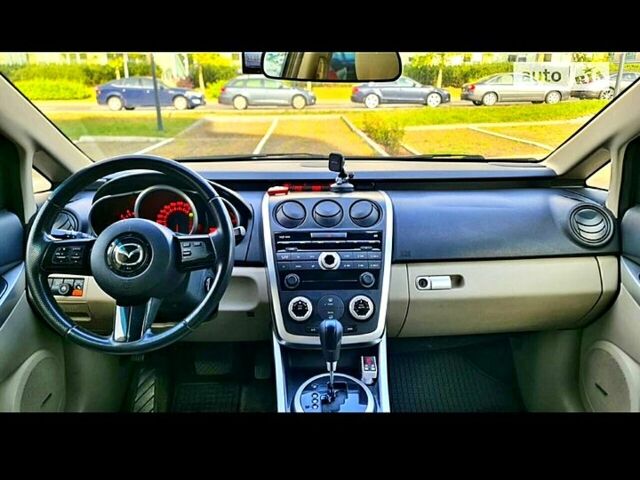 Красный Мазда СХ-7, объемом двигателя 2.3 л и пробегом 240 тыс. км за 7500 $, фото 5 на Automoto.ua