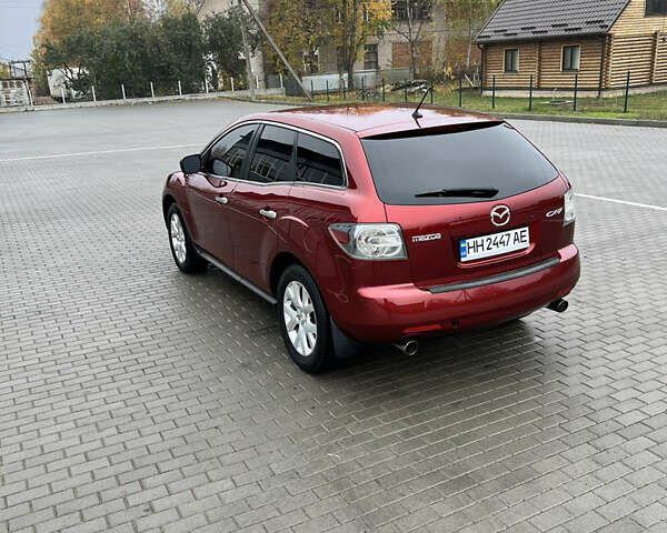 Красный Мазда СХ-7, объемом двигателя 2.26 л и пробегом 74 тыс. км за 7950 $, фото 5 на Automoto.ua