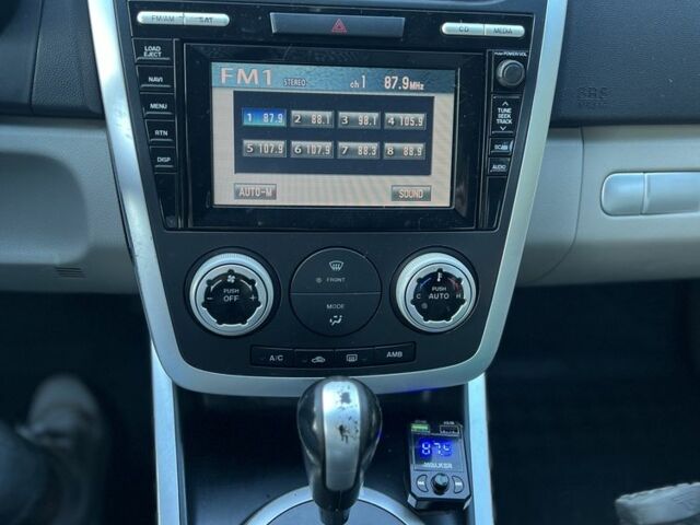 Красный Мазда СХ-7, объемом двигателя 2.3 л и пробегом 157 тыс. км за 7500 $, фото 9 на Automoto.ua