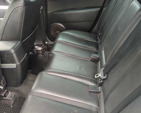 Красный Мазда СХ-7, объемом двигателя 2.26 л и пробегом 203 тыс. км за 7300 $, фото 7 на Automoto.ua