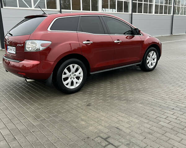 Красный Мазда СХ-7, объемом двигателя 2.26 л и пробегом 74 тыс. км за 7950 $, фото 12 на Automoto.ua