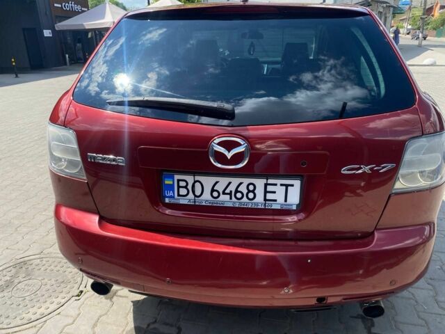 Красный Мазда СХ-7, объемом двигателя 2.3 л и пробегом 142 тыс. км за 6500 $, фото 22 на Automoto.ua